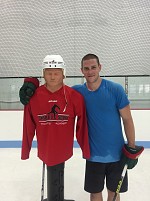 Minnesota Wild's Charlie Coyle with STS Joe Bender